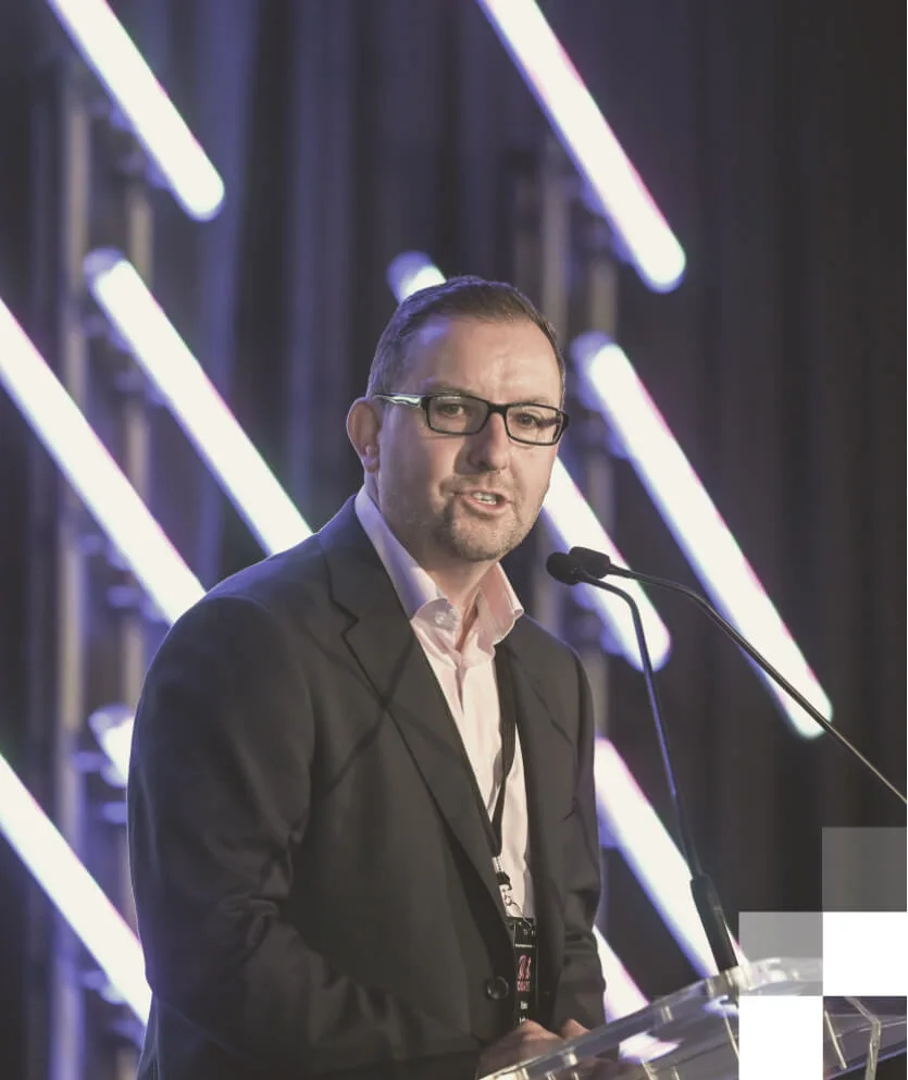 Eoin Loftus presenting at a hotel industry conference